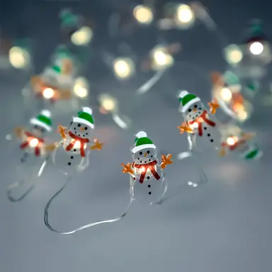 LUCES NAVIDAD A PILAS 20 LEDS MUÑEC